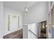 Bright foyer features wood floors, decorative chandelier and an arched front door with sidelights at 640 Lochaven Rd, Weddington, NC 28173