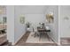 Modern office space with wood floors, natural light, neutral walls, and a stylish desk at 640 Lochaven Rd, Weddington, NC 28173