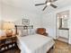 Charming bedroom with a cozy chair and an ensuite bathroom at 6531 Hazelton Dr, Charlotte, NC 28210