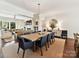 An open floor plan view of the dining room into the living room, showcasing the natural light at 6531 Hazelton Dr, Charlotte, NC 28210