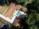 Aerial view showcases the backyard, pool, patio, and landscaping of this stunning property at 6745 Lancer Dr, Charlotte, NC 28226