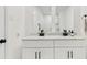 This bathroom features dual sinks with a marble countertop and modern fixtures at 6745 Lancer Dr, Charlotte, NC 28226