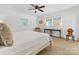 Tranquil bedroom with natural light, neutral decor, and comfortable furnishings, creating a serene retreat at 6745 Lancer Dr, Charlotte, NC 28226