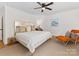 Bright bedroom with a ceiling fan, a comfortable chair, and a window at 6745 Lancer Dr, Charlotte, NC 28226
