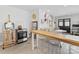 Contemporary kitchen features a breakfast bar, oven, and an adjacent seating area at 6745 Lancer Dr, Charlotte, NC 28226