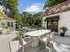 Backyard with a swimming pool, outdoor dining area, and meticulously landscaped garden at 6745 Lancer Dr, Charlotte, NC 28226