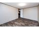 Comfortable bedroom featuring wood-look flooring, two closets, and an open doorway at 716 Sharon Ln, Iron Station, NC 28080