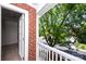 Private balcony with brick columns and white railing offers a scenic view at 7554 Bluestar Ln, Charlotte, NC 28226