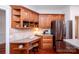 Kitchen workstation with custom wood cabinets and stainless steel appliances at 7554 Bluestar Ln, Charlotte, NC 28226