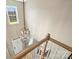 Grand foyer with a modern chandelier, staircase, and view of the front door at 8417 Hirsch Dr, Charlotte, NC 28277