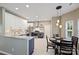Modern kitchen with two-tone cabinetry, stainless steel appliances, and granite countertops at 8417 Hirsch Dr, Charlotte, NC 28277