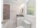 Updated bathroom featuring a tiled shower/tub, granite vanity, and modern finishes at 909 Lakeview St, Kannapolis, NC 28083