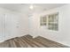 Bright bedroom with ceiling fan, window, and closet, creating a cozy and functional space at 909 Lakeview St, Kannapolis, NC 28083
