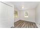 Comfortable bedroom featuring a ceiling fan, and natural light from two windows at 909 Lakeview St, Kannapolis, NC 28083