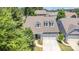 This aerial view features a well-maintained house, 2-car garage, and landscaped front yard at 101 Daybreak Ln, Belmont, NC 28012