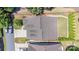 Aerial shot showcases the property's roof, driveway, landscaped yard, and nearby street access at 101 Daybreak Ln, Belmont, NC 28012