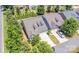 An aerial shot of the neighborhood showcases lush trees and a well-maintained homes at 101 Daybreak Ln, Belmont, NC 28012