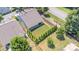 Aerial view of the fenced backyard, complemented by lush greenery, trees, and manicured lawns at 101 Daybreak Ln, Belmont, NC 28012