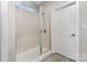 Bathroom featuring a glass shower with a built-in seat at 101 Daybreak Ln, Belmont, NC 28012