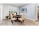 Cozy dining room with a round table, modern chairs, and bright natural light at 101 Daybreak Ln, Belmont, NC 28012