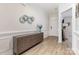 Inviting entryway with wainscoting, modern console table, and attractive wood-look floors at 101 Daybreak Ln, Belmont, NC 28012