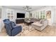 Relaxing living room featuring plush seating, stylish decor, and plenty of natural light at 101 Daybreak Ln, Belmont, NC 28012
