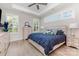 Spacious main bedroom with a tray ceiling, plush carpeting, and ample natural light at 101 Daybreak Ln, Belmont, NC 28012
