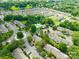 Enjoy the birds-eye view of this property nestled in a well-maintained community with lush landscaping and swimming pool at 11521 Savannah Creek Dr, Charlotte, NC 28273
