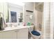 Bright bathroom featuring a white vanity, ample counter space, and a shower-tub combination at 11521 Savannah Creek Dr, Charlotte, NC 28273
