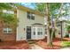 Charming two-story home with a cozy bay window, a decorative wreath, and beautiful landscaping at 11521 Savannah Creek Dr, Charlotte, NC 28273