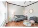 Well-decorated living room showcasing a comfortable gray sofa, stylish accents, and a bright, airy ambiance at 11521 Savannah Creek Dr, Charlotte, NC 28273