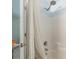 Clean bathroom showcasing a shower-tub combo with updated fixtures and a light blue wall at 11521 Savannah Creek Dr, Charlotte, NC 28273