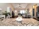 View from the kitchen island into the living room with high ceilings and plenty of natural light at 117 Franklin St, Clover, SC 29710