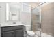 Clean and modern bathroom with glass-enclosed shower, and stylish vanity at 12140 Mcdowell Pl, Huntersville, NC 28078