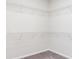 Walk-in closet features ample storage space with custom shelving units at 12140 Mcdowell Pl, Huntersville, NC 28078