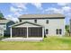 A two-story home with a screened in porch and black aluminum fencing at 12140 Mcdowell Pl, Huntersville, NC 28078