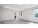 Spacious main bedroom boasts tray ceiling, natural light and en-suite bathroom at 12140 Mcdowell Pl, Huntersville, NC 28078