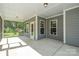 Enjoy the outdoors from this screened porch with views of the private backyard at 12140 Mcdowell Pl, Huntersville, NC 28078