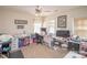 Bright bonus room featuring multiple windows and ceiling fan at 1304 Hammond Dr, Matthews, NC 28104