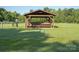 Dog park with agility equipment and a covered seating area, perfect for pet owners at 1304 Hammond Dr, Matthews, NC 28104