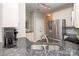 Spacious kitchen featuring granite countertops, stainless refrigerator and track lighting at 1304 Hammond Dr, Matthews, NC 28104