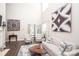 Spacious living room featuring modern decor, ample seating, and abundant natural light, creating a welcoming space at 1304 Hammond Dr, Matthews, NC 28104
