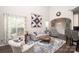 Bright living room with modern furniture, hardwood floors, and natural light, perfect for relaxing and entertaining at 1304 Hammond Dr, Matthews, NC 28104