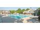 Community pool with a slide and plenty of chairs for relaxing and enjoying the sun at 1304 Hammond Dr, Matthews, NC 28104
