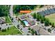 A community pool and clubhouse are nestled in a tree lined neighborhood at 17711 North Shore Cir, Cornelius, NC 28031