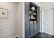 Built-in shelving unit providing ample storage space with decorative baskets and neutral decor at 17711 North Shore Cir, Cornelius, NC 28031