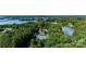 Scenic aerial view showcases community amenities, with lake access at 18439 Victoria Bay Dr, Cornelius, NC 28031