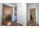 Open hallway leads to the dining room and kitchen at 18439 Victoria Bay Dr, Cornelius, NC 28031