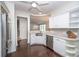 Bright kitchen features stainless appliances, white cabinets and granite countertops at 18439 Victoria Bay Dr, Cornelius, NC 28031