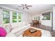 Open concept living room featuring hardwood floors and great natural lighting at 18439 Victoria Bay Dr, Cornelius, NC 28031